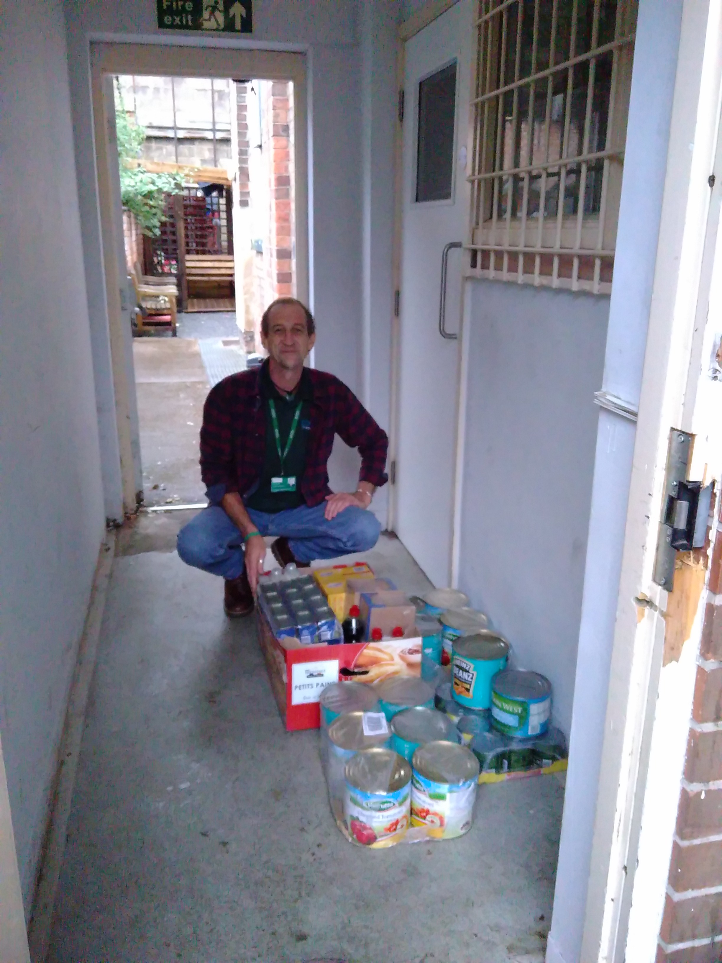 The Padley Centre volunteer accepting a food donation