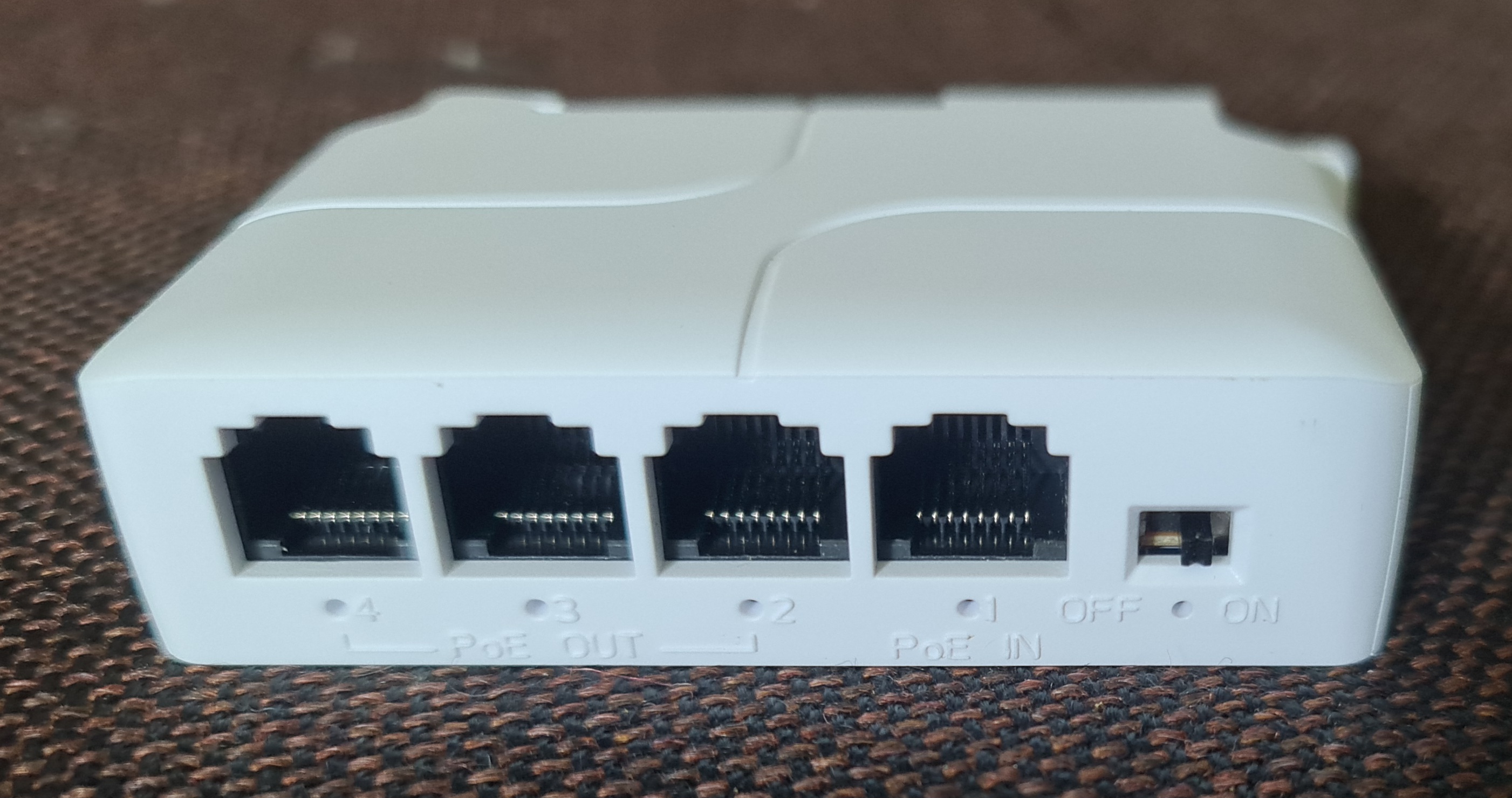 Front, showing 4 ports and the "VLAN" switch